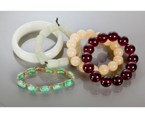 COLLECTION OF CHINESE BEADS
including jade bangle, amber effect beads, etc (5) 