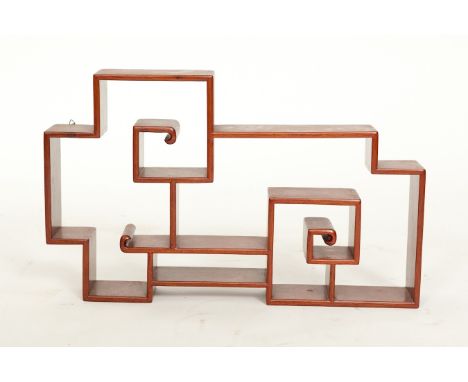 CHINESE STAGED SHELF
of stepped wooden form, 66cm wide