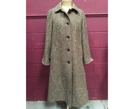 Aquascutum women's wool tweed overcoat with attached scarf.