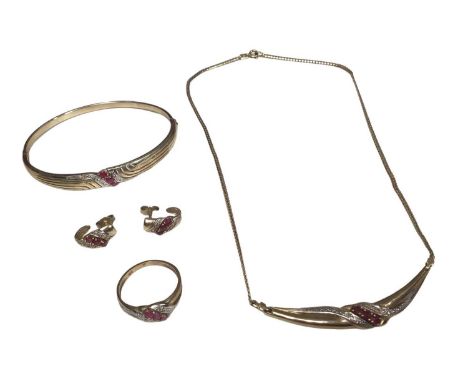 Ruby and diamond suite of jewellery in 9ct gold setting to include a necklace, bangle, ring and earringsTotal weight 17.7 gra