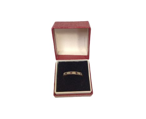 18ct gold diamond and ruby half eternity ringStamped '18ct' and weighs 2.3 grams