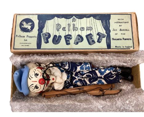 A rare Pelham Puppet SM white faced clown, in original card boxCondition is good to very good, minor tears to box lid .  The 