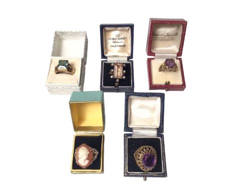 Five gold and gem set cocktail rings to include a 9ct gold cameo ring, size Q, 9ct gold purple stone ring in pierced mount, s