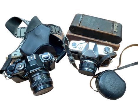 Collection of cameras and camera equipment, including Minolta, Kowa, etc