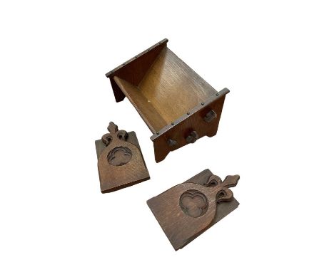 Arts and Crafts period oak ecclesiastical bookends in the Gothic style, together with oak arts and crafts period book trough 