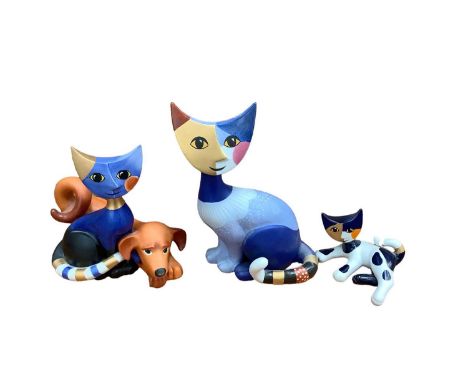 Collection of Goebel cats by Rosine Wachtmeister, including a display stand made by Rosine