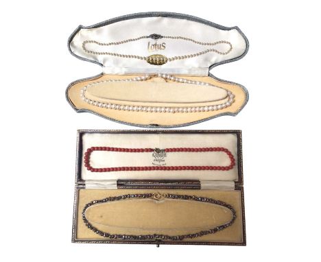 Old coral bead necklace with a string of coral beads on gold clasp, a freshwater grey cultured pearl necklace on 18ct gold cl