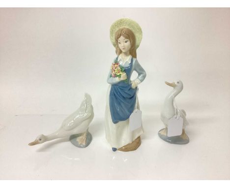 Two Nao porcelain geese, Lladro style figure of a girl holding flowers, selection of Murano glass sweets, glass pedestal dish