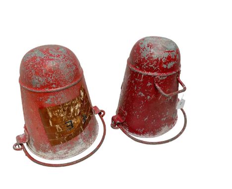 Two vintage red painted galvanised metal fire buckets with swing handles.