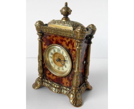 An Edwardian brass and tortoiseshell carriage clock by the British United Clock Co. Ltd, a Schatz & Sohne carriage clock and 