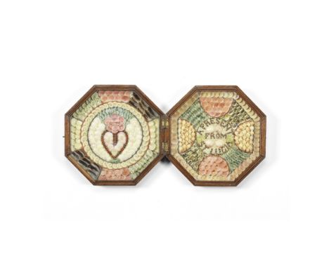 A SMALL SHELL-WORK SAILOR'S DOUBLE VALENTINE, 'A PRESENT FROM ST LUCIA', ST LUCIA, 19TH CENTURY,the hinged octagonal mahogany