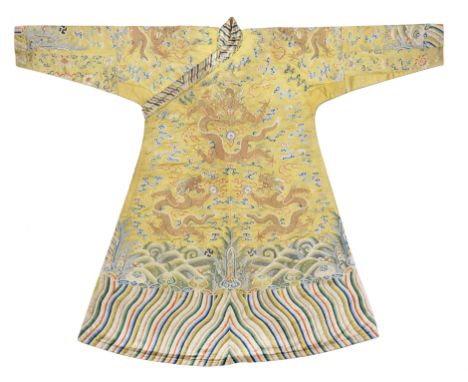 A VERY RARE IMPERIAL YELLOW SATIN EMBROIDERED CHUBAThe silk YongzhengThe side-closing chuba tailored in Tibet from Chinese 18