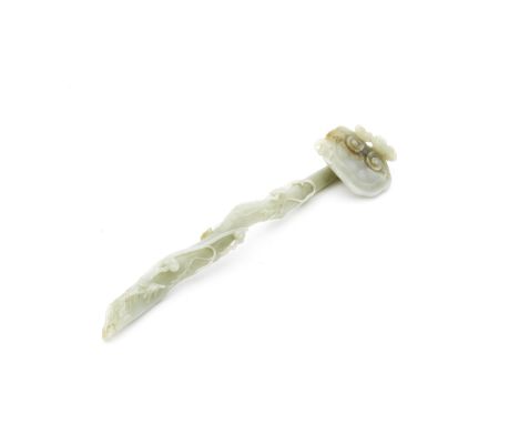 A PALE GREEN JADE 'LINGZHI' RUYI SCEPTRE18th/19th centuryNaturalistically carved as a long gnarled branch entwined with bambo