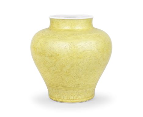 A RARE YELLOW-GLAZED INCISED 'DRAGON' JAR, GUANKangxi The vessel heavily potted with an ovoid body surmounted by a short neck