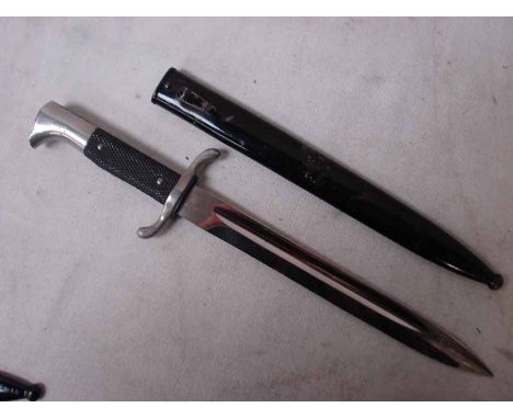 A Nazi, Third Reich Fireman's Dress Dagger made by Carl Henkel. 24.5cm chrome plated steel blade in the usual form in a paint