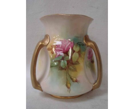 A Royal Worcester three handled vase of dimpled baluster form, painted with panels of pink and crimson rose blooms, signed F 