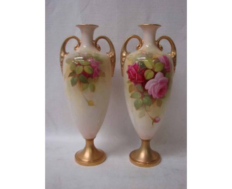 A pair of early 20th century Royal Worcester  two handled vases, ovoid form with everted neck and circular spreading foot, ha
