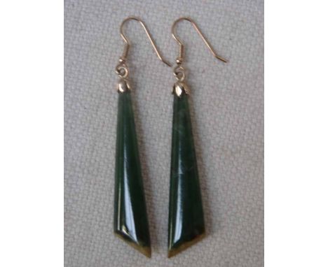 A pair of 18ct yellow gold ear pendants set with tapering oval section seaweed jade droppers 5cm long, 7.4g