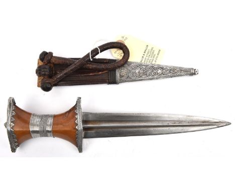 A good quality 19th century Sudanese arm dagger,  blade 8" with raised rib and two narrow fullers on each side, the hilt of p