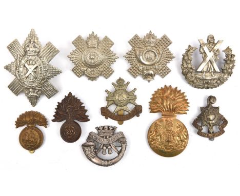 10 cap/glengarry badges:  4th/5th R Scots, Northumberland Fus, KC R Fus, ERII KOSB, DCLI (brooch pin), R Sussex, Black Watch 