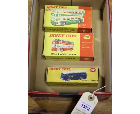 3 Dinky Buses/coach. 2x Leyland Atlantean Buses. One in off white and red with Regent adverts. Plus a green and white example