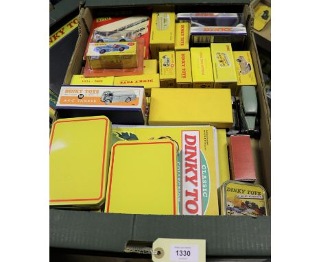 A quantity of Atlas Dinky and other Dinky related items. Including Caravan (811), Renault Dauphine (24E), Citroen DS19 (24CP)