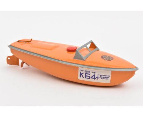 A seldom seen Sutcliffe tinplate clockwork Boat. In orange livery, an example produced for the Windemere Steamboat Museum and