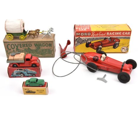 4 Various Makes. Chad Valley 'Wee-Kin' clockwork lorry. In red with grey body and complete with correct key. Mobo remote cont