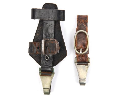 A Third Reich vertical hanger for an SS dagger,  of black leather with nickel silver spring clip; and a brown leather hanger 