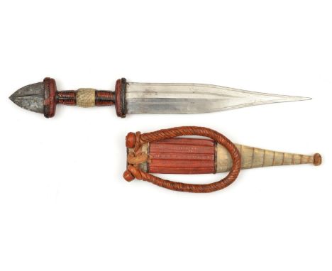 A well made North African tribal dagger, 2nd half of the 20th century, broad DE tapered blade 7½", with short blade shaped ir
