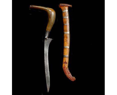 A North Sumatran dagger rencong,  Aceh 19th century, curved SE blade 20cms (refinished), one piece curved and swollen hulu me