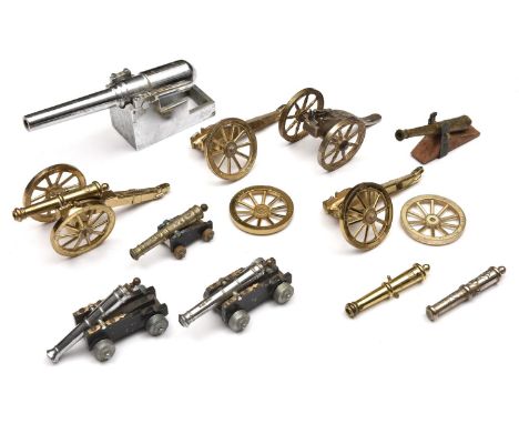 A chrome plated brass model of a 19th century muzzle loading coastal defence gun, stepped barrel 7¾", on a simple stepped car