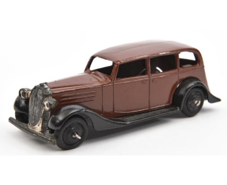 Dinky Toys 30 Series Vauxhall (30d). In dark brown with closed black chassis, black ridged wheels and black rubber tyres. VGC