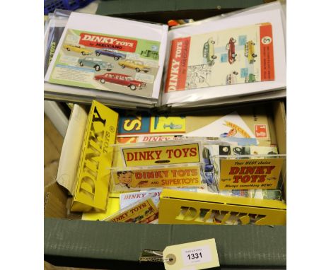 A collection of original and reproduction mostly Dinky range Catalogues, card display material and small metal signs. An albu