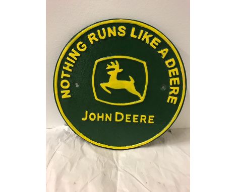 A Cast Iron John Deere Tractor sign