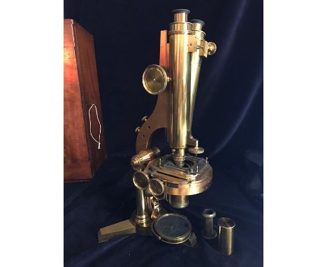 A R and J Beck Microscope in a case, No 6705 and a box of accessories