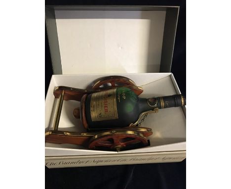 A Boxed bottle of Courvoisier Cognac in a Cannon Decanter mount and original box.