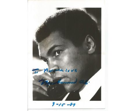 Muhammed Ali signed 7x5 b/w photo. Dedicated to Norma love 9-15-89. Slight silvering to image on front of hair and has light 