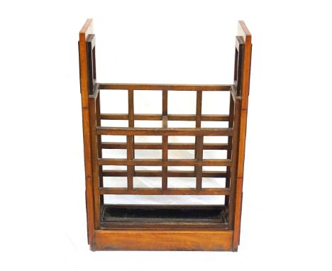 ART DECO WALNUT STICK STANDwith rectangular sides with pierced upper sections above geometric step panel sides, the front and