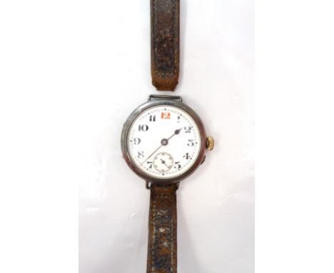 GENTLEMAN'S SILVER CASED WWI PERIOD TRENCH WRISTWATCHwith black Arabic numerals (red '12') and subsidiary dial on white ename