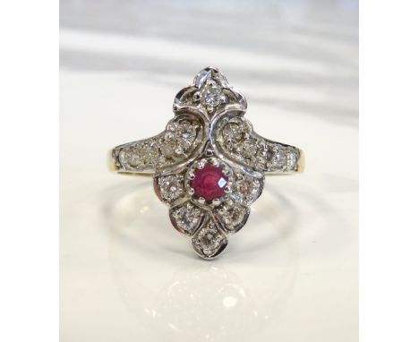 ART DECO STYLE RUBY AND DIAMOND PLAQUE RINGthe round cut ruby in multi diamond surround, on nine carat gold shank, ring size 