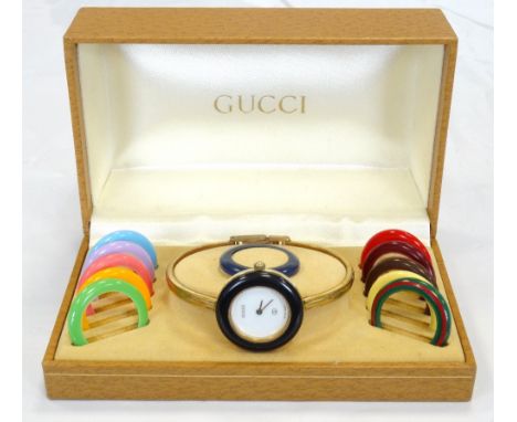 1980s LADIES GUCCI WRISTWATCH WITH MULTI-COLOURED INTERCHANGEABLE BEZELSthe circular white face without numerals, signed Gucc
