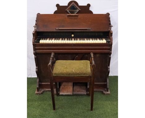 AMERICAN MAHOGANY PEDAL ORGANthe raised shaped back with an inset diamond shaped mirror above a lift up lid revealing a keybo