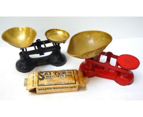 SET OF SALTER SHOP SCALESin red with a shaped brass goods trough and weights, together with a set of Scots of Stow kitchen sc