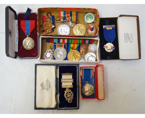 LOT OF FAMILY RELATED BRITISH MEDALScomprising a 1914-15 Star trio, named to '1359 Pte.T.M.Walker, R.A.M.C.'; miniature 1914-