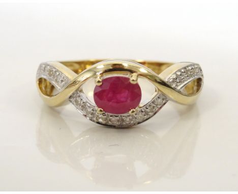 RUBY AND DIAMOND DRESS RINGon nine carat gold shank with decorative pierced twist setting, ring size L-M