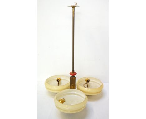 ART DECO CEILING LIGHTthe brass tube column with a red wood disk above a triangular lower section with three arms, each with 