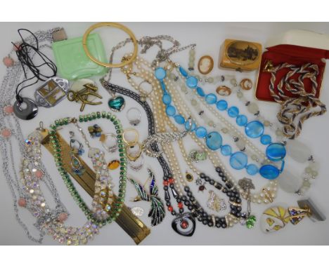 A large bird brooch and a collection of vintage costume jewellery Condition Report: Not available for this lot