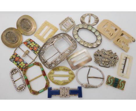 A collection of vintage buckles to include a white metal snake, and Deco examples Condition Report: Not available for this lo