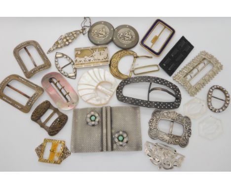 Mother of pearl, enamel and silver buckles and other examples Condition Report: Not available for this lot